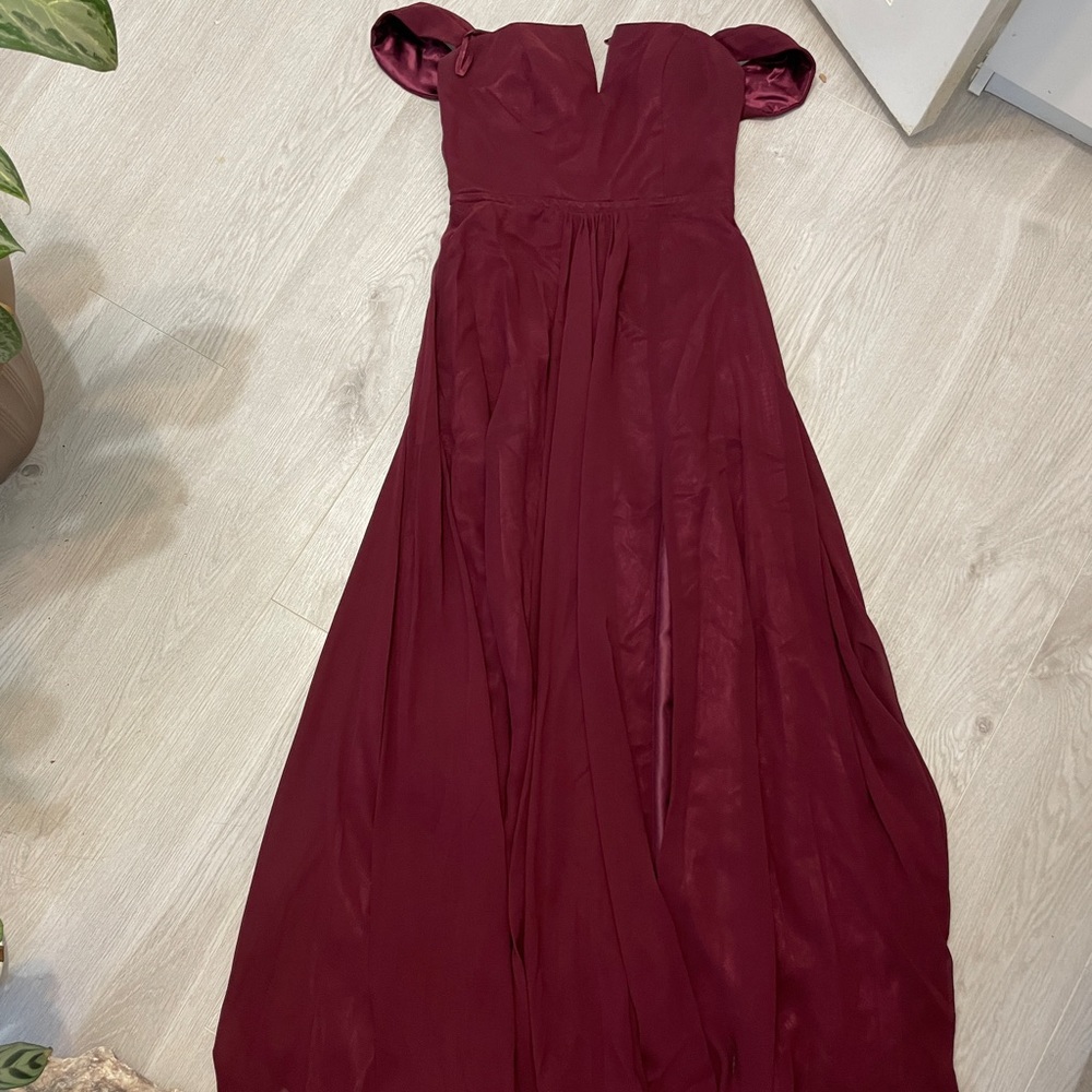 Burgundy gown with leg slit